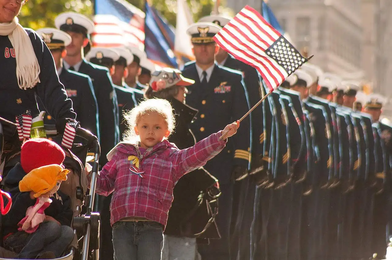 US_Coast_Guard_families_and_service_members_march_in_New_York_Citys_Veterans_Day_Parade_Image_4_of_7_10820800325 Thank you for your service! Image of U.S. Coast Guard families and service members in New York City Veterans Day Parade, also used for Memorial Day 2024 blog post